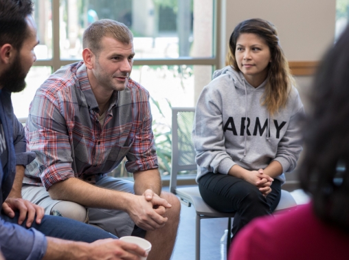 Veterans talk in a group therapy session