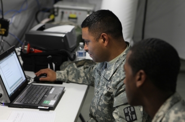 A soldier evaluates the new EMR system