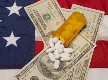pills and money on American flag
