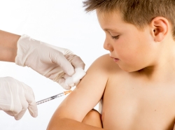 Boy being vaccinated