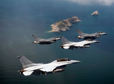 U.S and Korean fighter aircraft fly above Jik-Do Island near South Korea, August 14, 2013