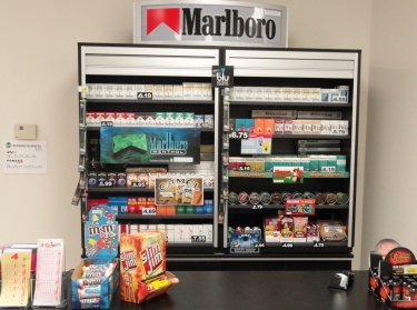 Tobacco product power wall behind the cashier