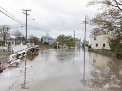 A flooded street in an oceanside community after Hurricane Sandy.