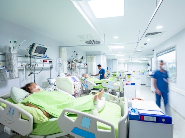COVID-19 patients in an intensive care unit, photo by JazzIRT/Getty Images