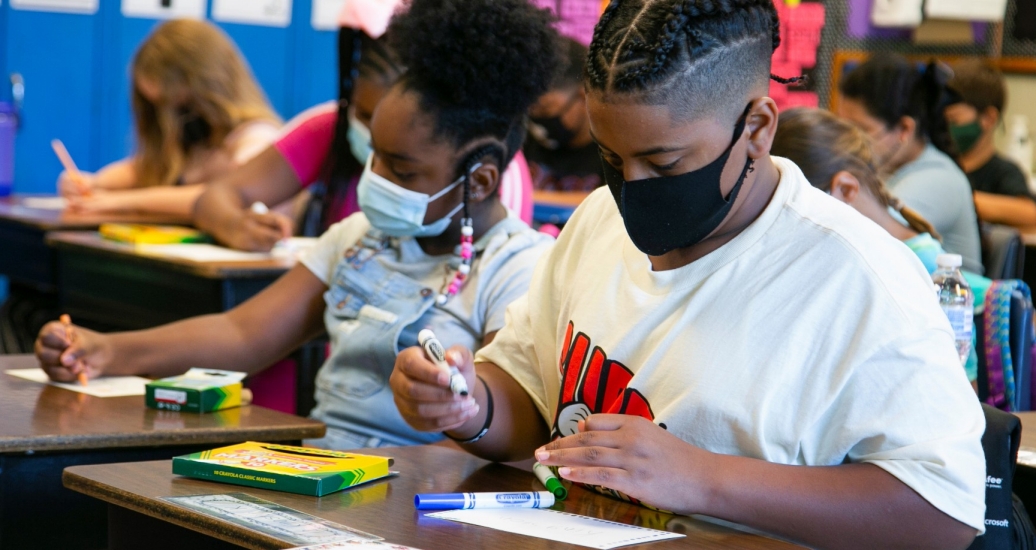 Students draw in class at Wilder Elementary School in Louisville, Kentucky, August 11, 2021