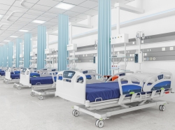 Empty beds in a hospital ward, photo by onurdongel/Getty Images