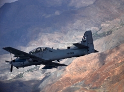 An A-29 Super Tucano flies over Afghanistan during a training mission, April 6, 2016