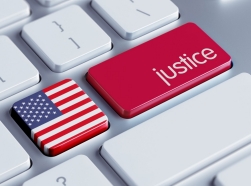 A keyboard with a justice button and U.S. flag
