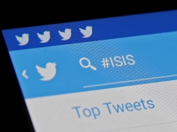 The ISIS hashtag is seen typed into a Twitter smartphone app, February 6, 2016