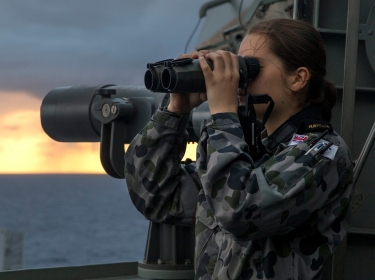 Midshipman Rachel Bolitho looks out from the bridge wing of HMAS Canberra during Sea Series 2015