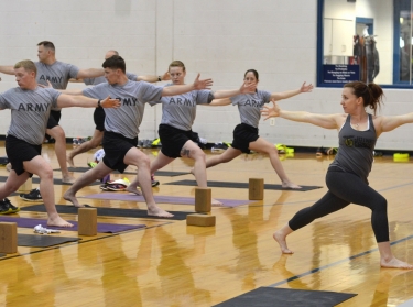 Army soldiers take a yoga class at Fort Campbell, Kentucky, April 23, 2015