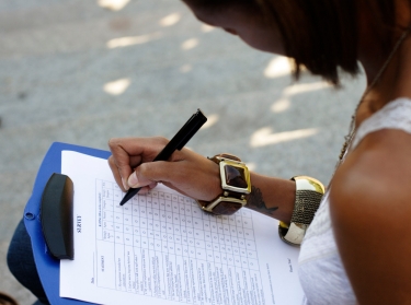 Woman filling out a survey