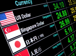 Currency exchange rates are displayed on a digital LED screen