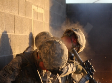 Soldiers particpate in an urban combat exercise