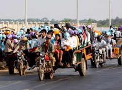 Cambodian garment factory workers travel home from work in Kampong Chhnang province, north of Phnom Penh