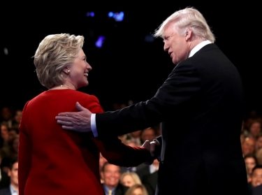Donald Trump shakes hands with Hillary Clinton at the start of the first presidential debate at Hofstra University in Hempstead, New York, September 26, 2016