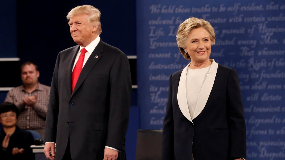 Republican U.S. presidential nominee Donald Trump and Democratic U.S. presidential nominee Hillary Clinton during their presidential town hall debate at Washington University in St. Louis, Missouri, October 9, 2016