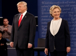 Republican U.S. presidential nominee Donald Trump and Democratic U.S. presidential nominee Hillary Clinton during their presidential town hall debate at Washington University in St. Louis, Missouri, October 9, 2016
