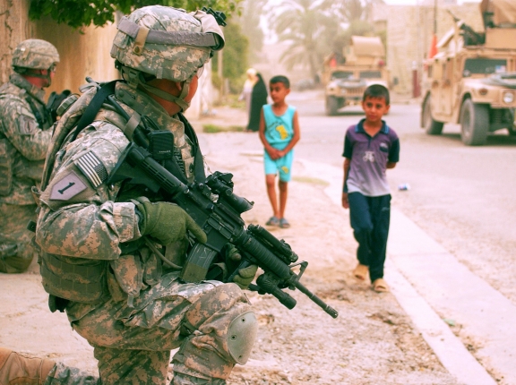 U.S. Army Soldiers provide security during a mission in Yarmouk, Iraq, July 2007