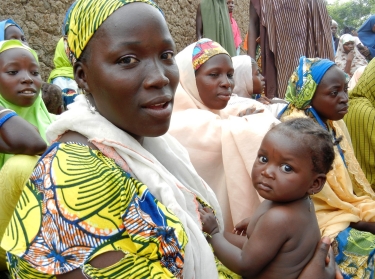 Woman attends a health education session in northern Nigeria