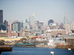 New York City skyline with ships in the foreground