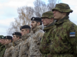 Lithuanian, Latvian, and Estonian soldiers stand in formation for the closing ceremony of exercise Silver Arrow in Adazi, Latvia, October 31, 2016