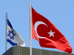 Turkish and Israeli flags fly atop the Turkish embassy in Tel Aviv, Israel, June 26, 2016