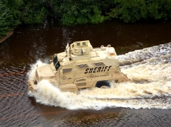 A mine-resistant, ambush-protected vehicle was used to extract people day and night from flooded areas in Florence County, North Carolina