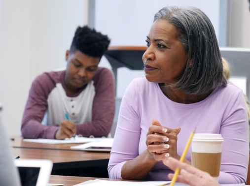 Educator listens during a parent-teacher conference