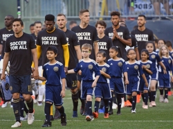 Members of youth soccer teams walk onto the field with the Philadelphia Union before a match against the Portland Timbers at Talen Energy Stadium, Philadelphia, Pa., May 25, 2019, photo by Eric Hartline/USA Today Sports via Reuters