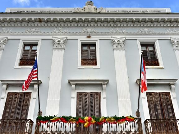 The Municipal Government Building of San Juan, Puerto Rico, built in the colonial style, photo by demerzel21/Getty Images