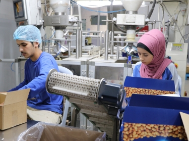 Two workers in a factory in Jordan, October 2018
