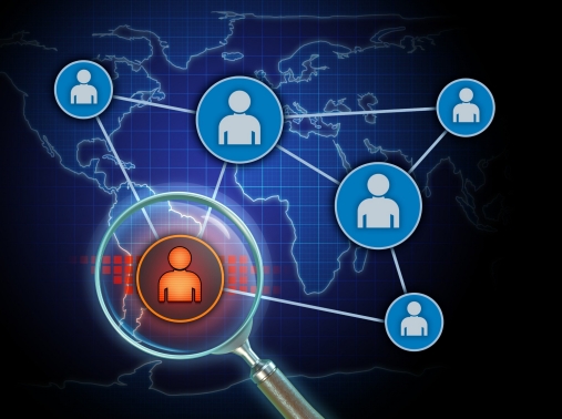 Diagram of an insider threat under a magnifying glass