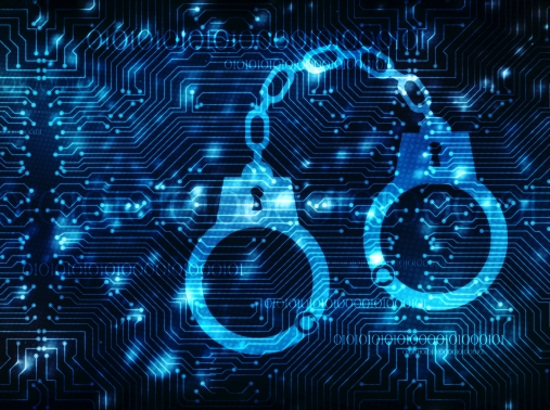 Cybercrime concept of handcuffs icon on a digital background