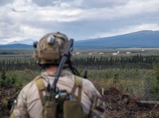 A Special Tactics Airman surveys a target following a training at Eielson Air Force Base, Alaska, August 16, 2018