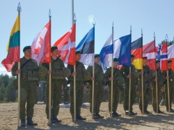 Soldiers represent their nation's flags during the opening ceremony of Saber Strike 2015 held in Pabrade, Lithuania, June 8, 2015, photo by Sgt. James Avery/U.S. Army