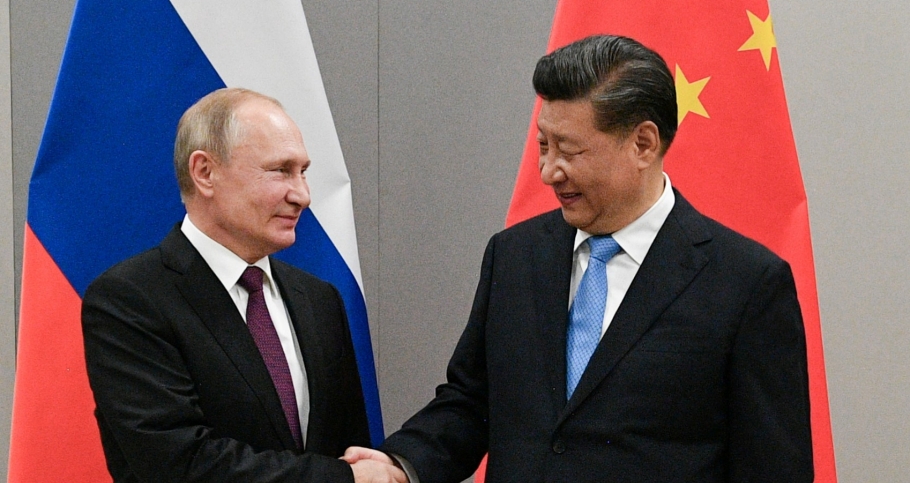 Russian President Vladimir Putin shakes hands with Chinese President Xi Jinping during their meeting on the sidelines of a BRICS summit, in Brasilia, Brazil, November 13, 2019, photo by Ramil Sitdikov/Sputnik via Reuters