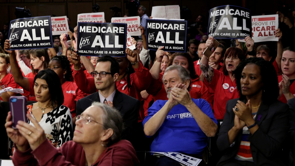 Supporters of a "Medicare for All" plan gather on Capitol Hill in Washington, D.C., September 13, 2017, photo by Yuri Gripas/Reuters