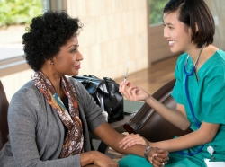 Nurse counseling a woman with diabetes