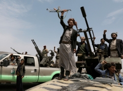 Houthi fighters during a gathering of Houthi loyalists on the outskirts of Sanaa, Yemen, July 8, 2020, photo by Khaled Abdullah/Reuters