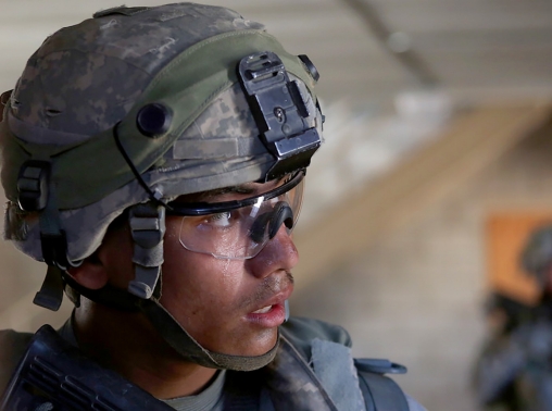 U.S. Army specialist in a door-to-door exercise at the National Training Center, Fort Irwin, California, June 20, 2014