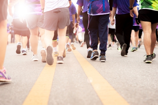 A group of people walking outside