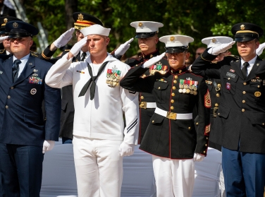 Servicemembers from all four military branches salute during the 50th Annual EOD Memorial Service, May 4, 2019, photo by Samuel King Jr./U.S. Air Force