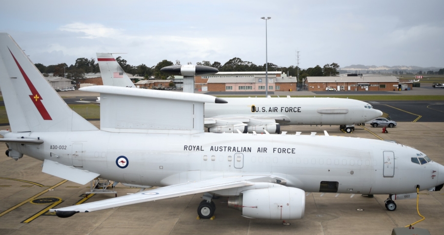 In the foreground, an early warning aircraft from the Royal Australian Air Force
