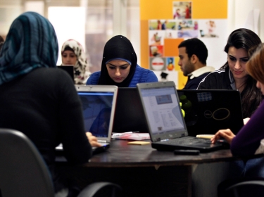 Jordanian youth use laptop computers
