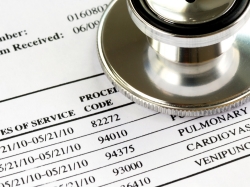 A stethoscope and a health insurance claim