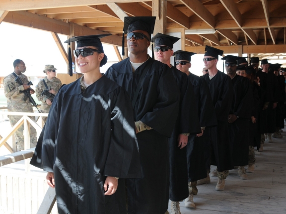 U.S. soldiers in line for the first-ever Kandahar Airfield college graduation ceremony, Afghanistan, May 23, 2012