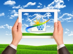 Holding a tablet computer with a weather icon