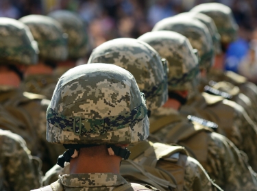 Rows of soldiers in helmets