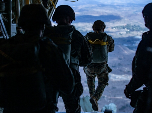 TU.S Marines static line jump from a KC-130J Hercules over Drop Zone Basilone on Marine Corps Base Camp Pendleton, Calif., December 10, 2020